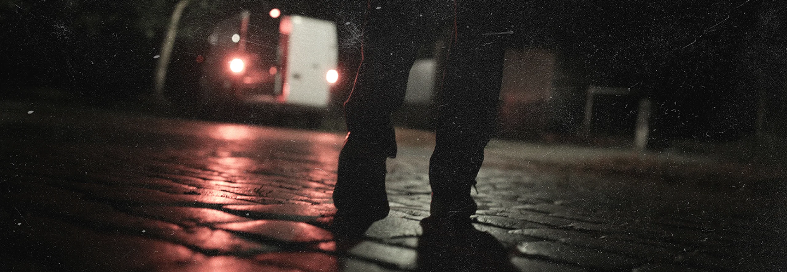Playlist - Footer Background - Ominous Figure Walks Towards a Van